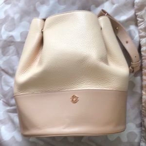 Dagne Dover pink bucket bag
